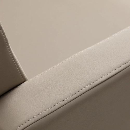 kappersstoel grijsbeige met zwarte voet